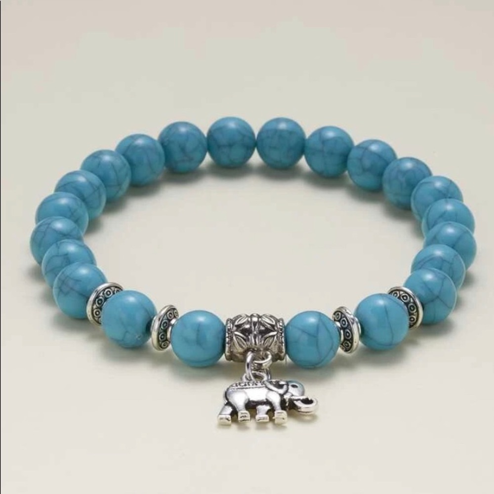 Turquoise stone bracelet with elephant charm